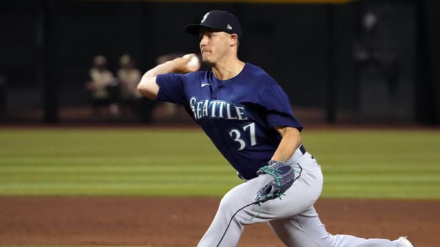 Paul Sewald pitches against the Diamondbacks at Chase Field